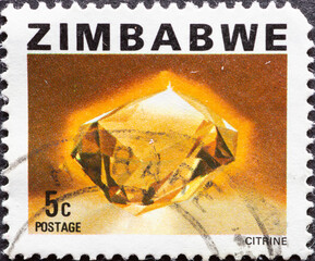 ZIMBABWE - CIRCA 1980: a postage stamp from ZIMBABWE , showing a Citrine gemstone. Circa 1980