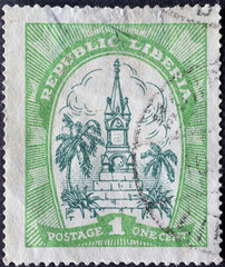 LIBERIA - CIRCA 1923 a postage stamp from LIBERIA , showing a Monument Memorial to J. J. Roberts,...