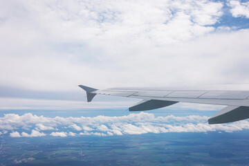 Fototapeta na wymiar Classic view through aircraft window onto jet engine.
