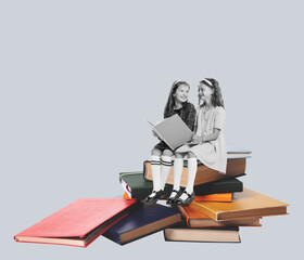 Contemporary art collage. Two beautiful girls, children sitting on books, reading isolated over...