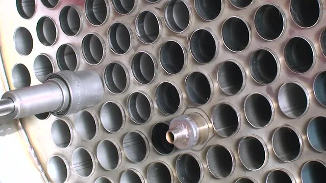 Condenser, evaporator, heat exchanger, inside tube pattern. Cooling tower making. Rolling tibe. Statin shot.