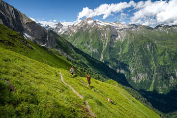 Hiking in the Salzburg region, couple hiking on a mountain trail in the Hohe Tauern, Kaprun, Salzburg region, Austria, Europe