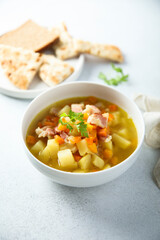 Homemade pea soup with smoked bacon