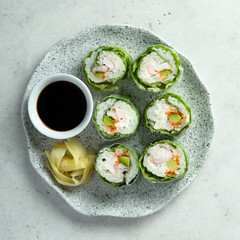 Healthy green sushi rolls with shrimps