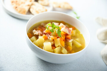 Homemade pea soup with smoked bacon