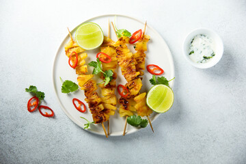 Healthy pineapple skewers with chili and lime