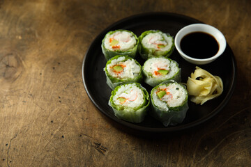 Healthy green sushi rolls with shrimps