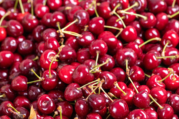 Fresh cherry. Close-up cherries in bulk. cherry background
