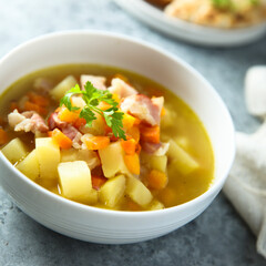 Homemade pea soup with smoked bacon