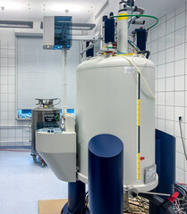 Nuclear magnetic resonance (NMR) system that contains a superconducting magnet. NMR is used in...