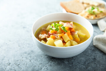 Homemade pea soup with smoked bacon