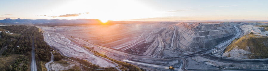 Aerial panoramic view of open cut coal mine in Bulga area of the Hunter Valley at dusk