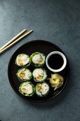Healthy green sushi rolls with shrimps