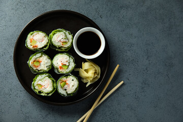 Healthy green sushi rolls with shrimps