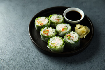 Healthy green sushi rolls with shrimps