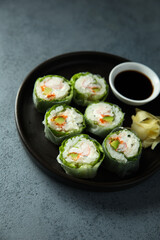 Healthy green sushi rolls with shrimps