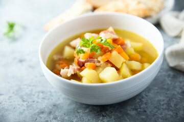 Homemade pea soup with smoked bacon