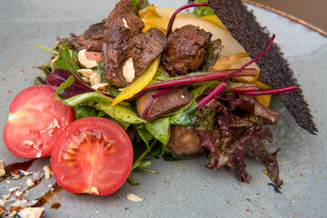 Chicken liver salad, mango, pear