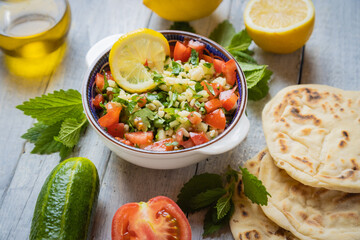 Lebanese tabbouleh salad with bulgur, parsley, tomato and cucmber