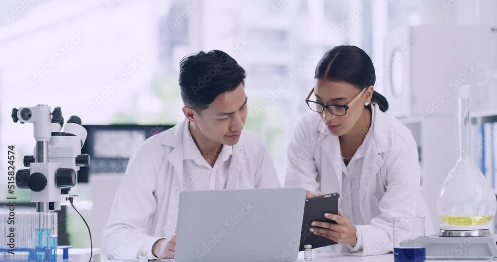 Poster Colleagues discussing forensic research and findings while analyzing medical data. Microbiologists developing innovative ideas with biotechnology. Two scientists working on a digital tablet in a lab