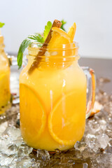 natural lemonade with orange, mint, cinnamon and ice
