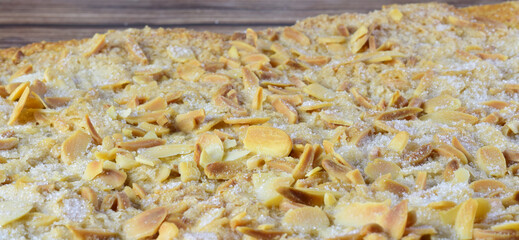 Coke of cracklings and almonds on top, typical sweet of Catalonia.