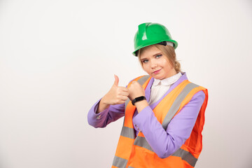Female industrial employee standing on white background