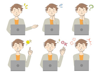 パソコンを操作する若い男性　表情　感情　正面