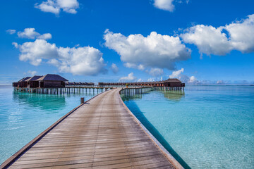 Fototapeta na wymiar Maldives paradise background. Tropical aerial landscape, seascape with long pier, water villas, amazing sea sky and lagoon beach, tropical nature. Exotic tourism destination banner, summer vacation