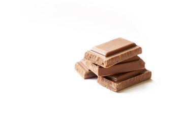 Ounce of chocolate on white color background