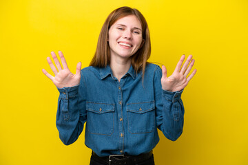 Young English woman isolated on yellow background counting ten with fingers