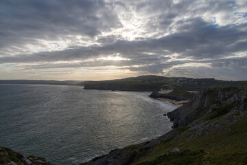 Fototapeta na wymiar sunset over three cliffs bay