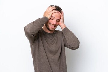 Young Brazilian man isolated on white background laughing