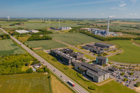 Panoramic aerial view of industrial park and bioenergy plant. Concept of sustainable production of biogas. Concept of biomass heat and power. Renewable and low carbon energies production.