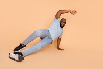 Full length body size view of attractive cool talented guy moving dancing break body isolated over...
