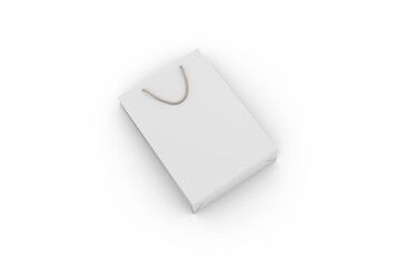 Eco-friendly white paper shopping bag with string handle isolated on white background