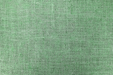 Fototapeta premium Green canvas texture with real linen threads on canvas with beautiful linen texture on canvas as sample of green linen canvas