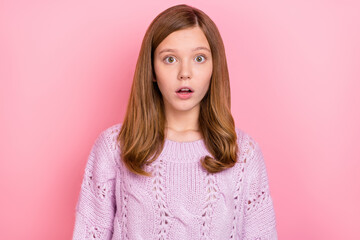 Fototapeta premium Portrait of attractive amazed girly teen girl sudden incredible news reaction isolated over pink pastel color background