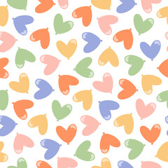 Seamless pattern with colorful heart shaped balloons.