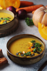 Bowls served with seasonal pumpkin soup