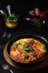 Traditional Spanish dish tortilla on the table