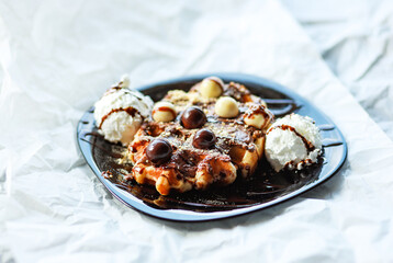 Delicious waffles on white background