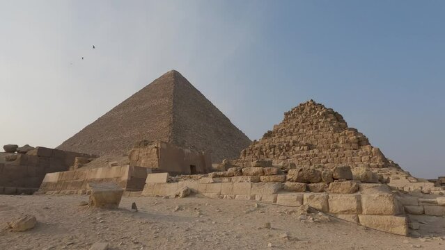 Egyptian pyramid of Khufu in Giza's pyramids complex. Architectural wonder. Wide shot without people