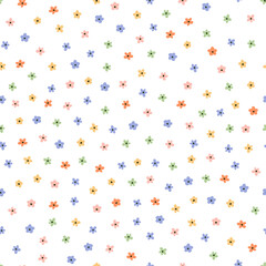 Seamless pattern with colorful tiny flowers.