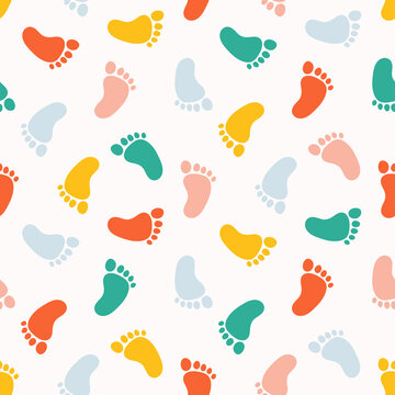 Seamless pattern with colorful baby footprints.