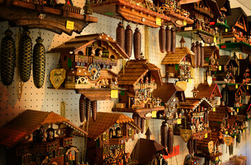 An array of cuckoo clocks, on display for sale in a shop in Switzerland