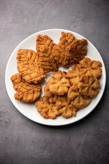 Thekua is an Indian sweet dish.popular in uttarpradesh, bihar and jharkhand.offering for the chhat festival.