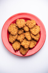 Thekua is an Indian sweet dish.popular in uttarpradesh, bihar and jharkhand.offering for the chhat festival.