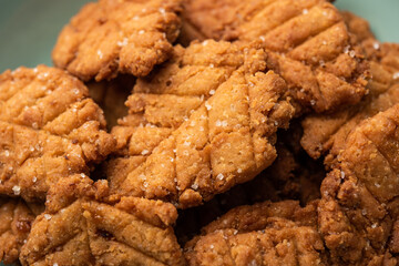 Thekua is an Indian sweet dish.popular in uttarpradesh, bihar and jharkhand.offering for the chhat festival.