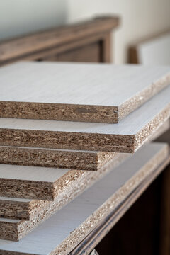 White melamine stack in kitchen furniture factory